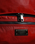 red-backpack-adjustable-zipper-logo-detail