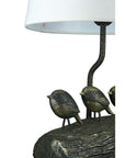 Zwart bronzen vogelfiguren op tafellamp