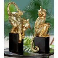 Set van 2 gouden aapjes op sokkel in polyresin sfeerbeeld