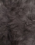 Schapenvacht kopen: Langharig grijs schapenvacht tapijt voor een natuurlijk interieur
