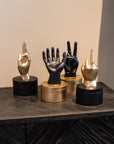 Hand beeldjes in 4 verschillende uitvoeringen als opberg box in zwart en goud resin materiaal