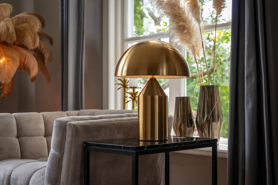 Duurzame roestvrijstalen tafellamp met een vleugje glamour