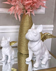 sculptuur van bulldog met gouden vleugels