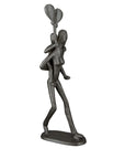 Figurine en métal noir mère avec enfant et ballon | H. 23 cm